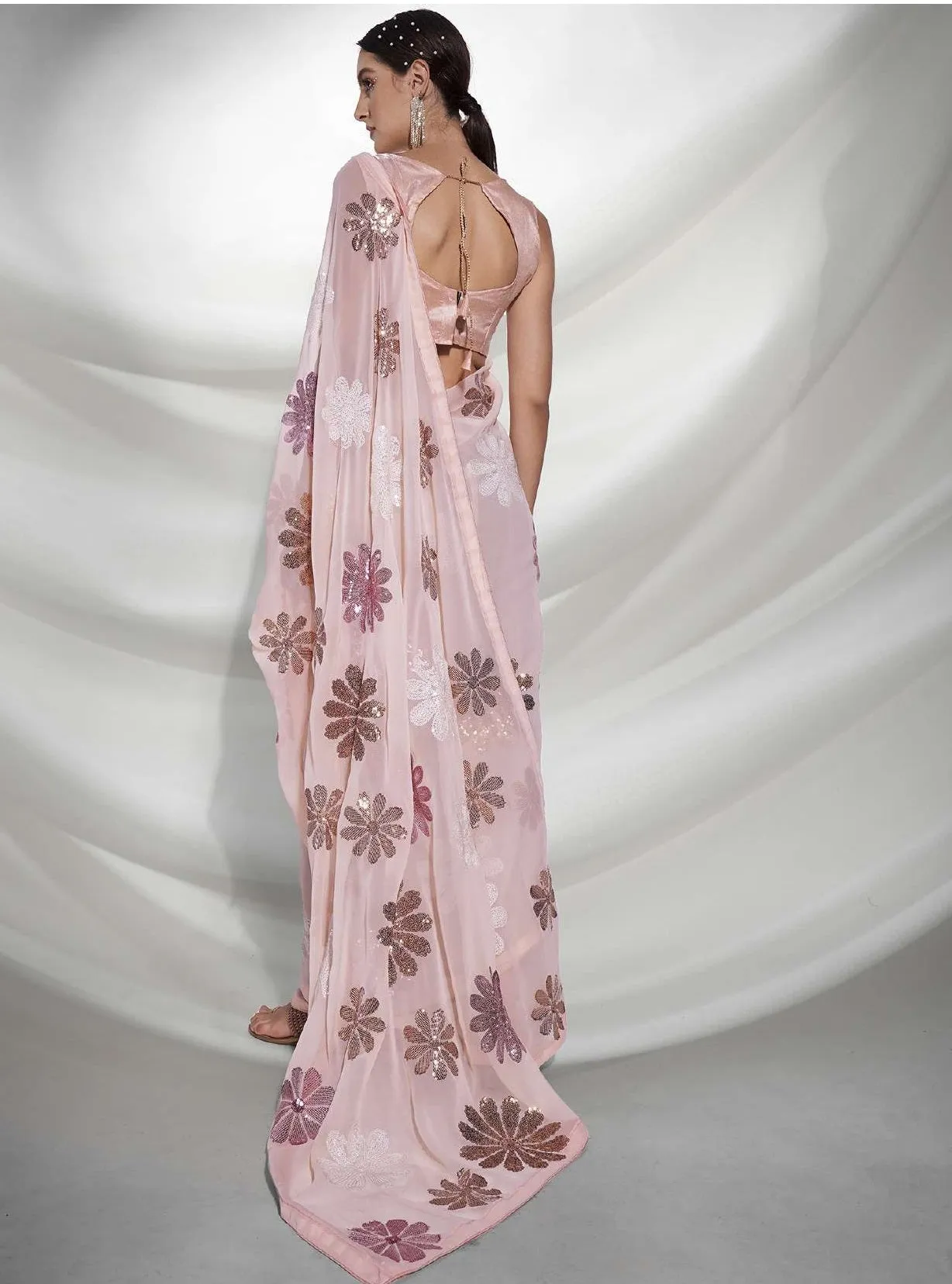 Women Party Wear Designer Sequence Worked Peach Colour Georgette Saree Collection
